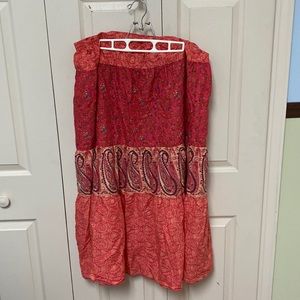 Long pink floral/paisley skirt. Elastic waist. No tags. Fits like L/XL.
